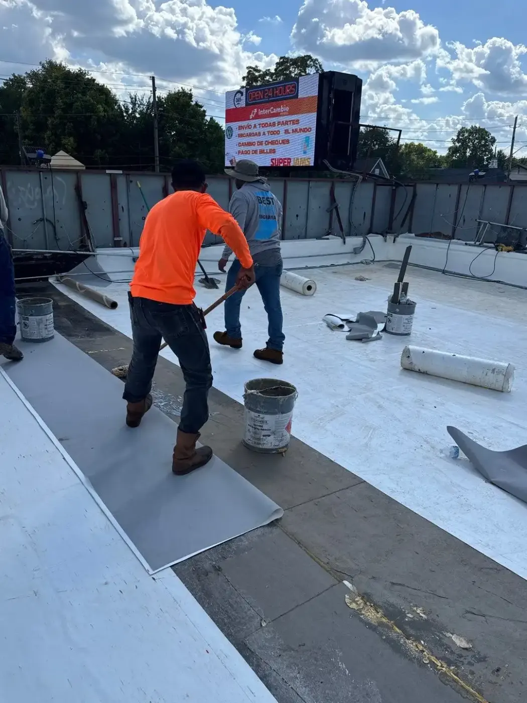 Tarping and dry-in on a Kirklin commercial roof